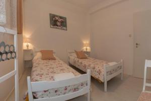 Posteľ alebo postele v izbe v ubytovaní Summer Bay Apartments