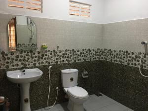 Koupelna v ubytování Sigiri Rangana Guesthouse + 13 fotografií