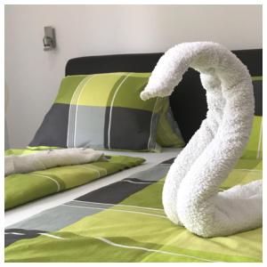 A bed or beds in a room at Attila Studio Apartments