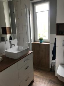 Kúpeľňa v ubytovaní Apartament 27 + 17 fotografií