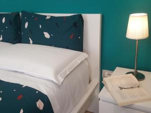 Postel nebo postele na pokoji v ubytování 14 B&B