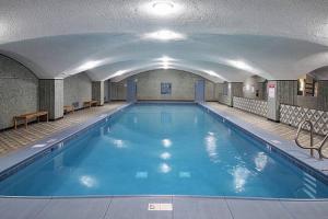 a large swimming pool in a building at Uptown Gem in Chicago