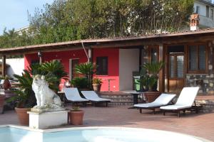 The swimming pool at or close to L'oasi di Ambra