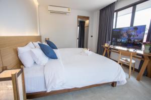 Postel nebo postele na pokoji v ubytování VIYA lodge