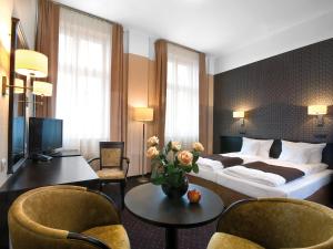 Posteľ alebo postele v izbe v ubytovaní Hotel Senator + 23 fotografií