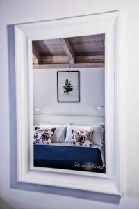 A bed or beds in a room at Borgo Noci