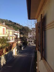 a view of a street from a window of a building at Appartamento nel Verde in Pietrasanta