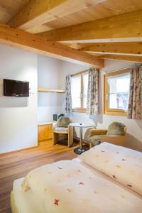 Postel nebo postele na pokoji v ubytování Hotel Blumental