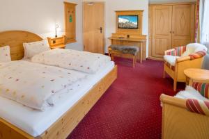 Postel nebo postele na pokoji v ubytování Hotel Blumental