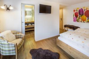 Postel nebo postele na pokoji v ubytování Hotel Blumental