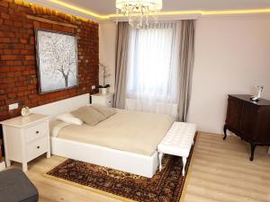Łóżko lub łóżka w pokoju w obiekcie Sea Apartment 150m do morza