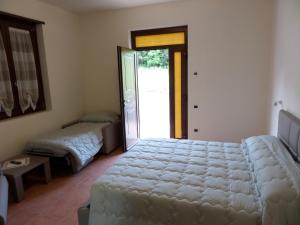 Postel nebo postele na pokoji v ubytování Resort La Selva