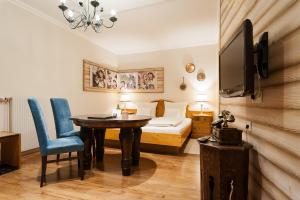 Posteľ alebo postele v izbe v ubytovaní Märchenhotel 3 Sterne Superior Waldpension Nebelstein