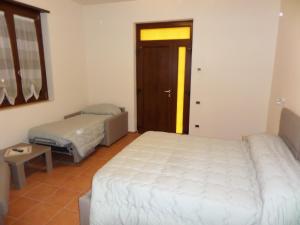 Postel nebo postele na pokoji v ubytování Resort La Selva