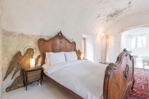 سرير أو أسرّة في غرفة في Chateau Třebešice