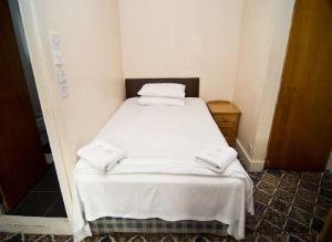 Postel nebo postele na pokoji v ubytování Charlie Hotel