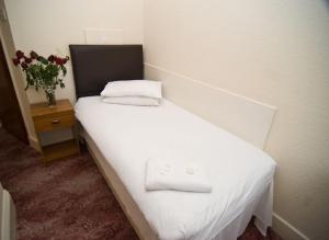 Postel nebo postele na pokoji v ubytování Charlie Hotel