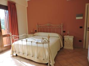 A bed or beds in a room at La Torre