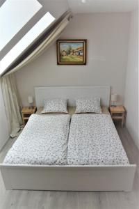 Postel nebo postele na pokoji v ubytování Farma Klínec