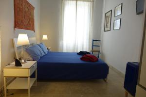 Postel nebo postele na pokoji v ubytování Casina Romita + 32 fotografií