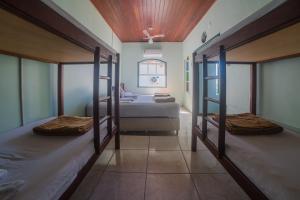 Americano's Suítes房間的床