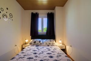 Ένα ή περισσότερα κρεβάτια σε δωμάτιο στο Apartment Monica