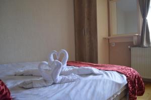 Posteľ alebo postele v izbe v ubytovaní Etno Restoran Ranc