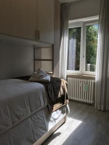 Posteľ alebo postele v izbe v ubytovaní A casa di Chiara