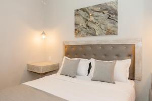 Ένα ή περισσότερα κρεβάτια σε δωμάτιο στο Hotel Boutique ADAZ