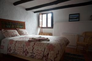 A bed or beds in a room at Casa Josefa