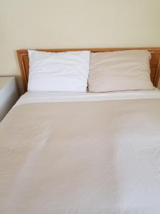 Postel nebo postele na pokoji v ubytování Melsask Motel