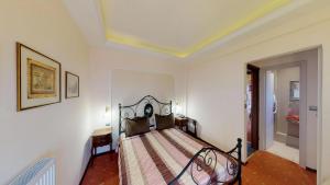 Rúm í herbergi á Hotel Mirto