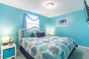 Ένα ή περισσότερα κρεβάτια σε δωμάτιο στο Villa Paradise, Pet Friendly +14 φωτογραφίες