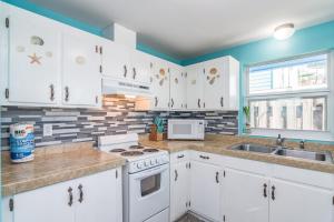 Η κουζίνα ή μικρή κουζίνα στο Villa Paradise, Pet Friendly