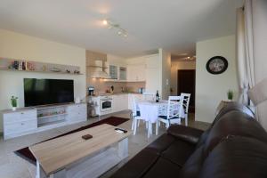 Kuchyň nebo kuchyňský kout v ubytování Apartment Soline Cove