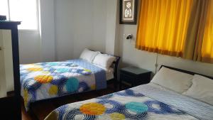 Postel nebo postele na pokoji v ubytování Hotel Ventura