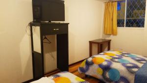 Postel nebo postele na pokoji v ubytování Hotel Ventura