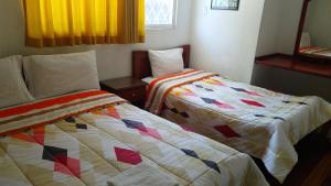 Postel nebo postele na pokoji v ubytování Hotel Ventura