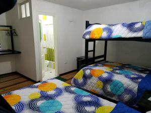 Postel nebo postele na pokoji v ubytování Hotel Ventura