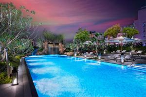 Kolam renang di atau dekat dengan MU Jiaoxi Hotel