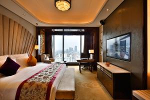 TV a/nebo společenská místnost v ubytování Chengdu CYNN Hotel