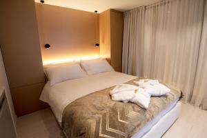 Posteľ alebo postele v izbe v ubytovaní Cinquanta4 Charme Apartment