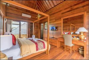 TV a/nebo společenská místnost v ubytování Lebak Bali Residence