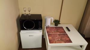 Kuchyň nebo kuchyňský kout v ubytování Taurus Apartments Vilnius