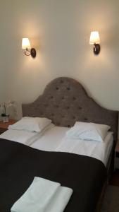 Postel nebo postele na pokoji v ubytování Taurus Apartments Vilnius