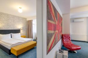 Postel nebo postele na pokoji v ubytování Apart Hotel Vlad Tepes