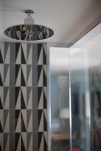 a chandelier hanging from a ceiling in a room at Grand Hotel Portovenere in Portovenere