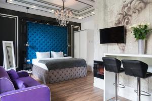 TV a/nebo společenská místnost v ubytování Theatre Boutique Apartments
