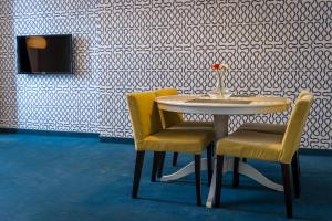 TV a/nebo společenská místnost v ubytování Apart Hotel Vlad Tepes