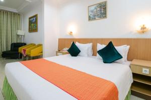 Postel nebo postele na pokoji v ubytování Mariani International Hotel + 37 fotografií